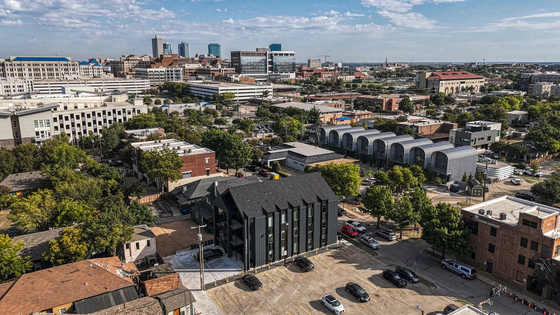 Panoramic view of Fort Worth skyline from the south side, showcasing downtown buildings and vibrant cityscape.